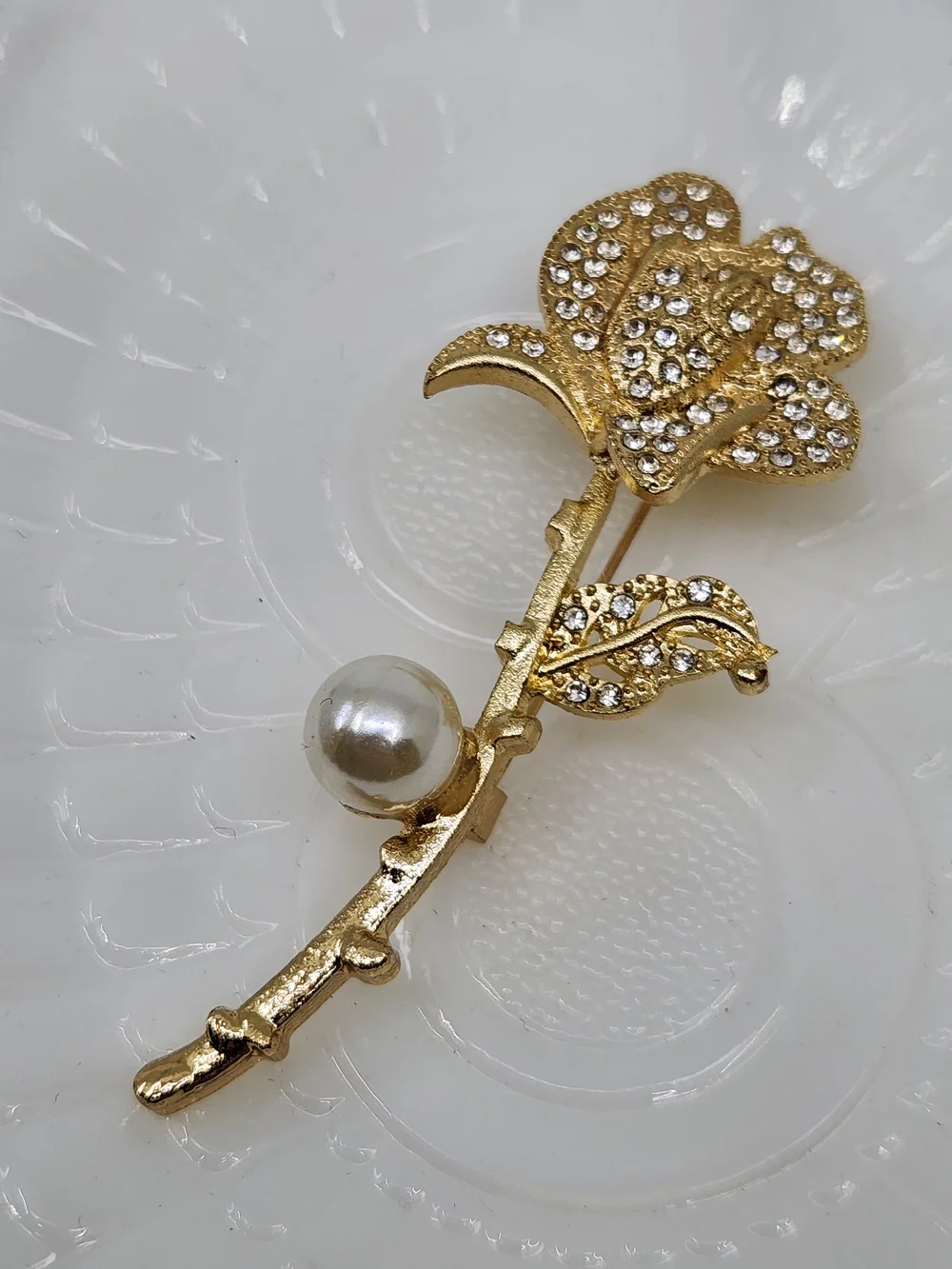 Gold Tone Crystal Rose Brooch with Faux Pearl Accent